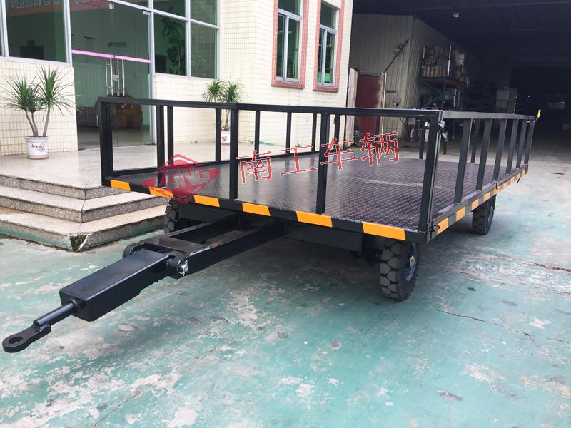 Unpowered forklift towing 6-ton guardrail type flatbed trailer black